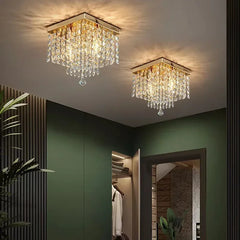 A sleek crystal ceiling lamp with a minimalist design, casting a warm glow in a modern bedroom.  Golden Atelier 3