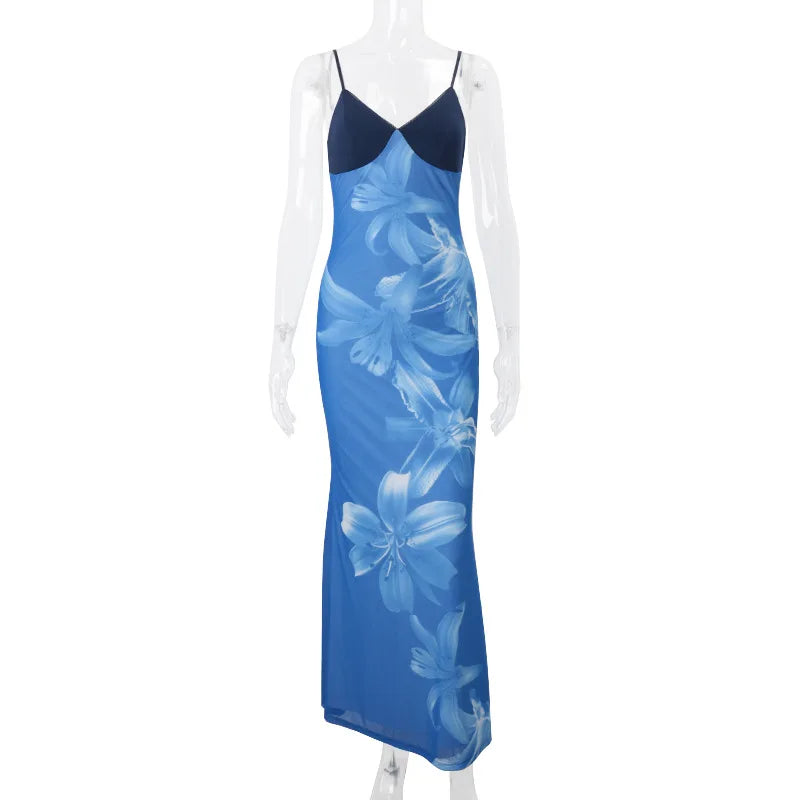 Blue floral dress on a mannequin against a white background