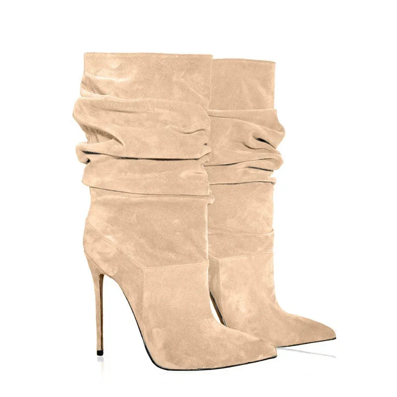 Pair of apricot faux suede pleated stiletto heel knee high dress boots