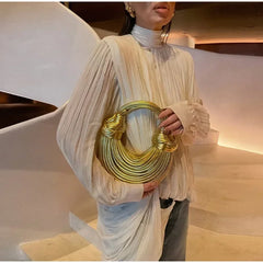 Full view of high neck asymmetrical pleated chiffon blouse