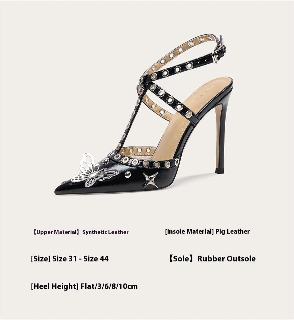 Black high-heeled shoe with studded details on a white background