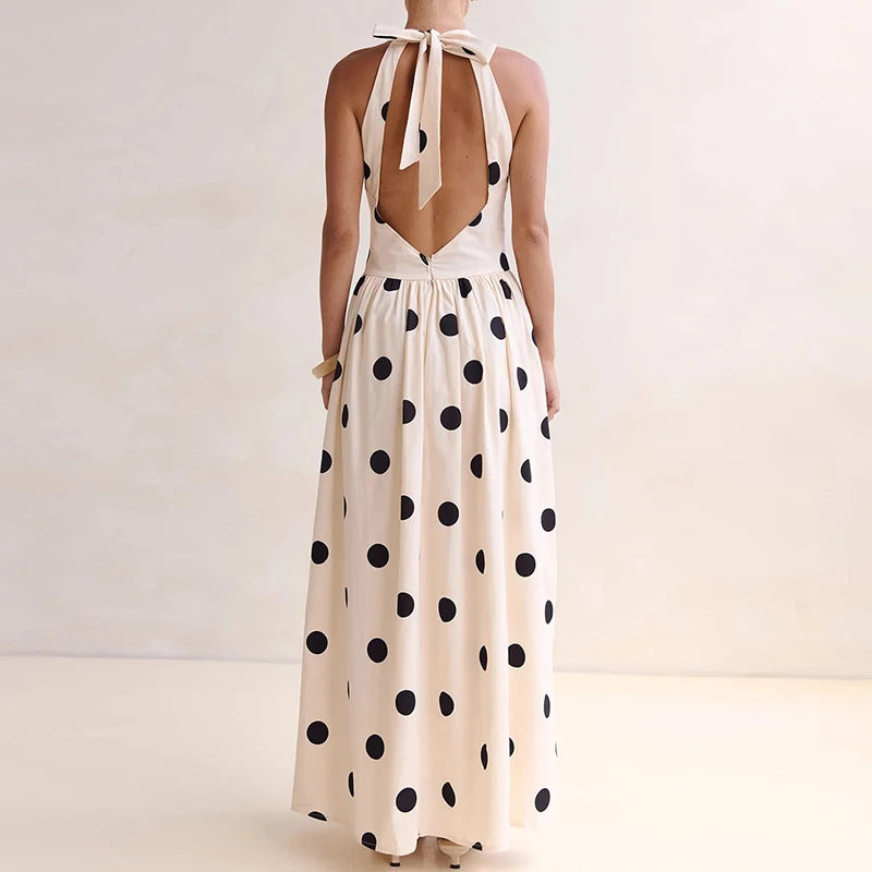 Back view of polka dot halter maxi dress