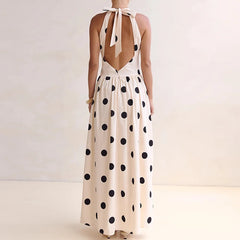 Back view of polka dot halter maxi dress