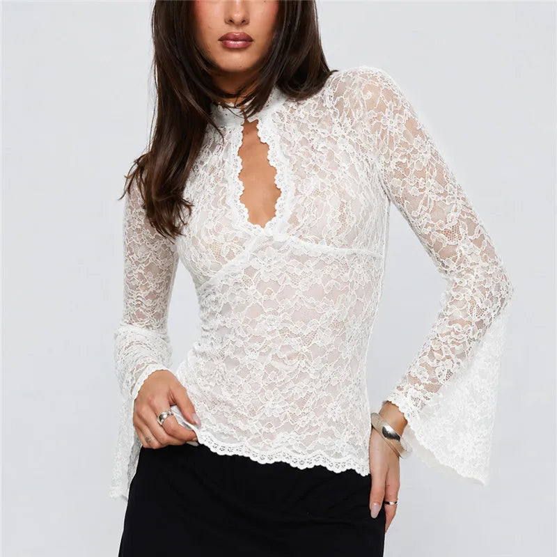 White sheer lace top with keyhole detail and flared sleeves