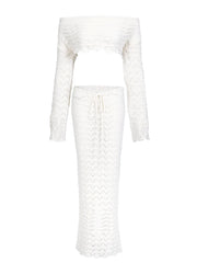 White lace top and skirt set on a white background