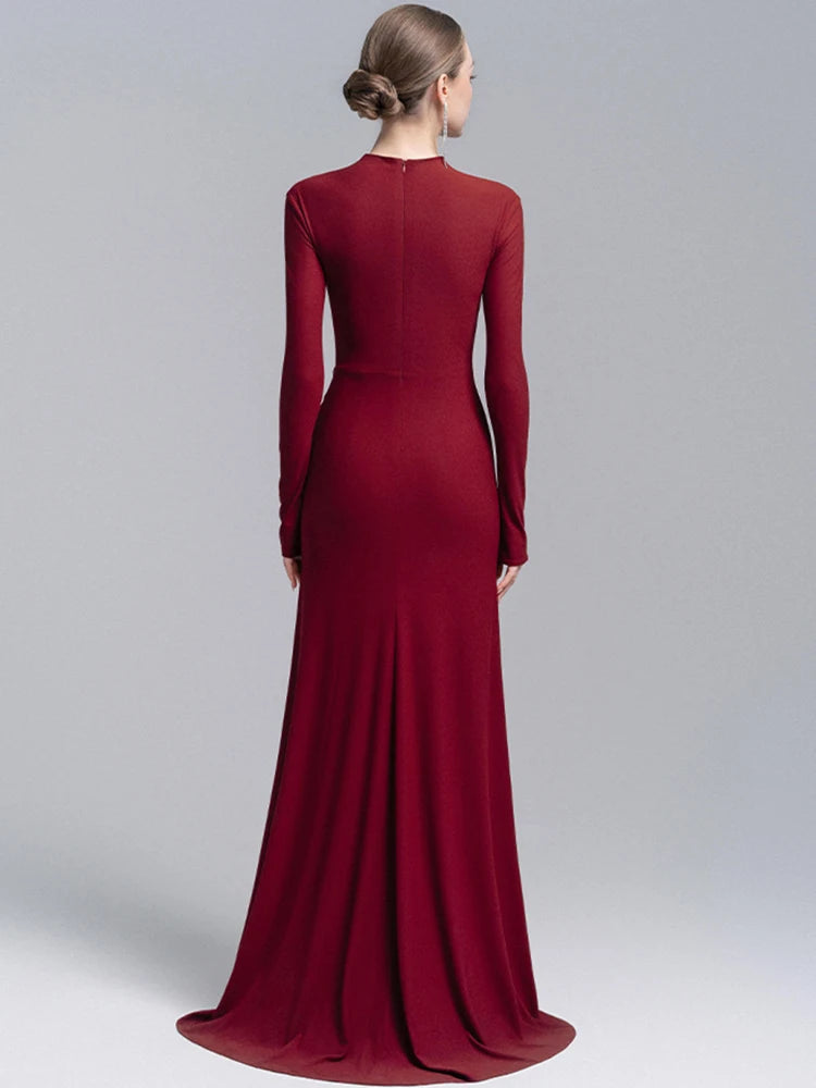 Red evening gown on a gray background