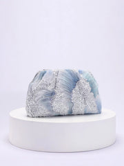 Marble-patterned product on a white pedestal with a light gray background