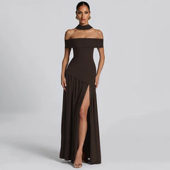Woman wearing a brown off-shoulder gown with a slit on a gray background