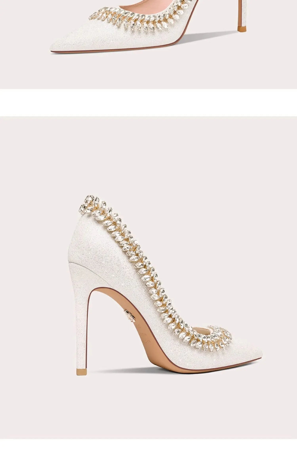 White high-heeled shoes with pearl embellishments on a light gray background