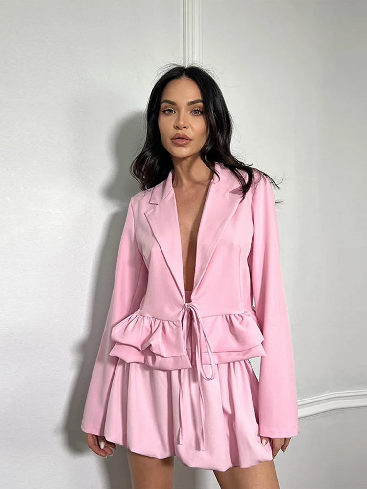 Elegant cropped blazer styled with a feminine silhouette