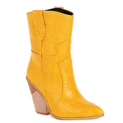 Yellow crocodile-patterned boot on a white background