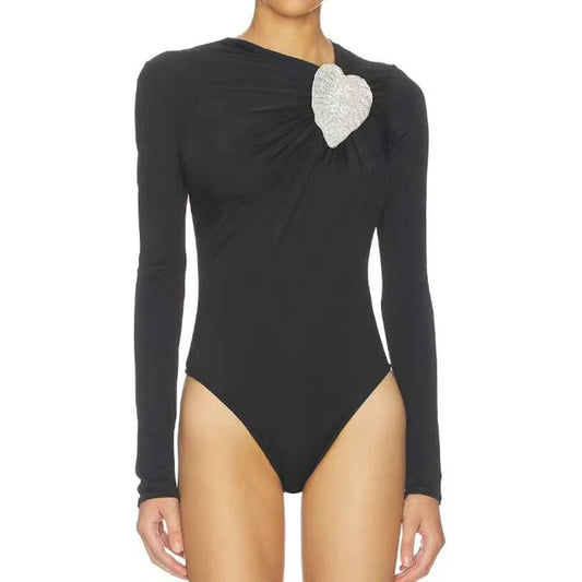 Black asymmetrical long-sleeve bodysuit with heart rhinestone