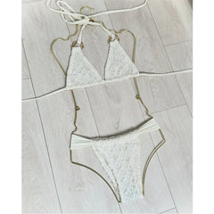 White crochet bikini set displayed flat.