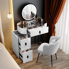 White vanity table with mirror and makeup items in a room with curtains and a chair.