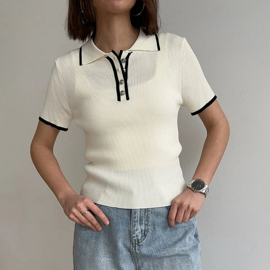 Ribbed knit polo collar cropped top with white color and black trim