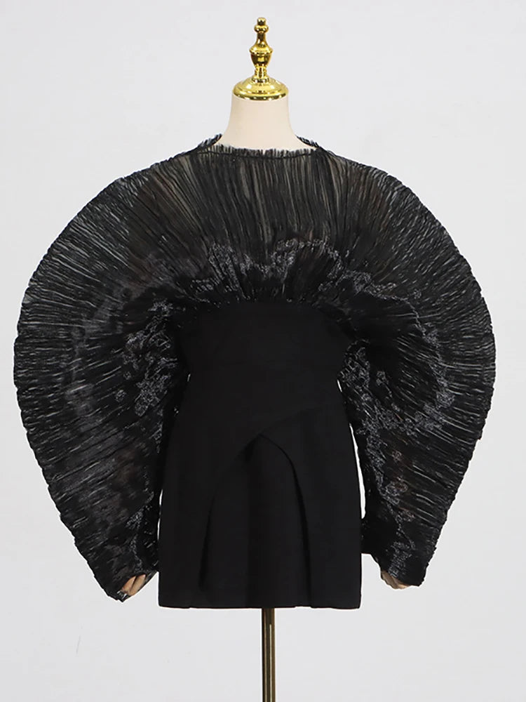 Pleated sleeve mini dress on mannequin