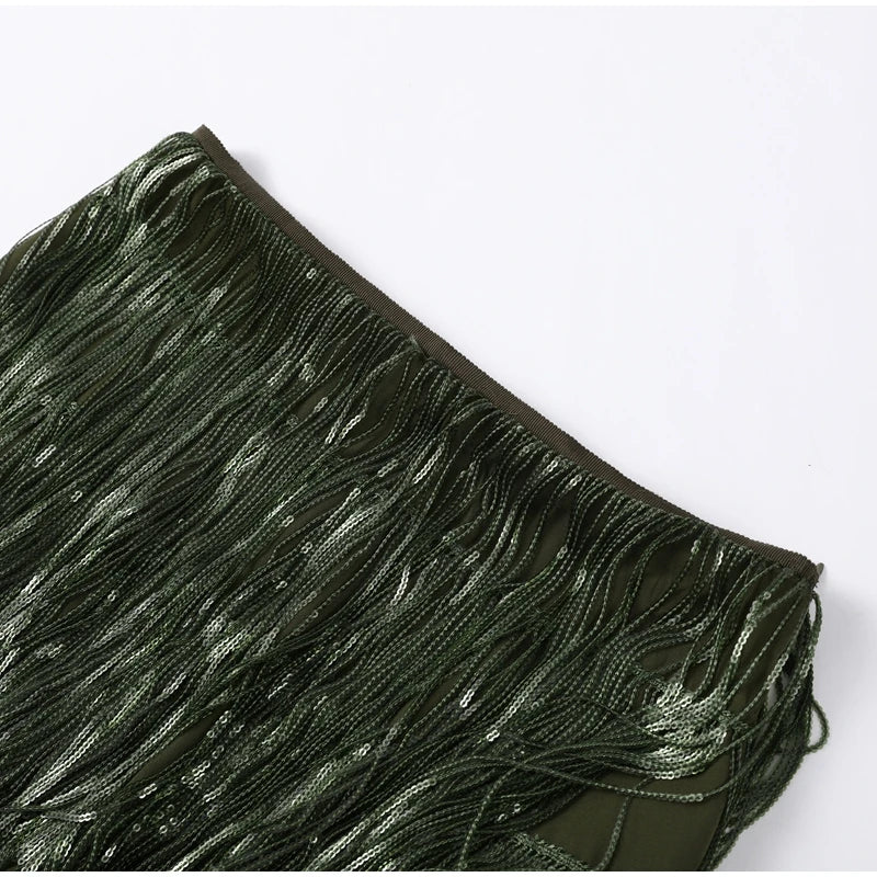 Close-up of green tinsel on a white background
