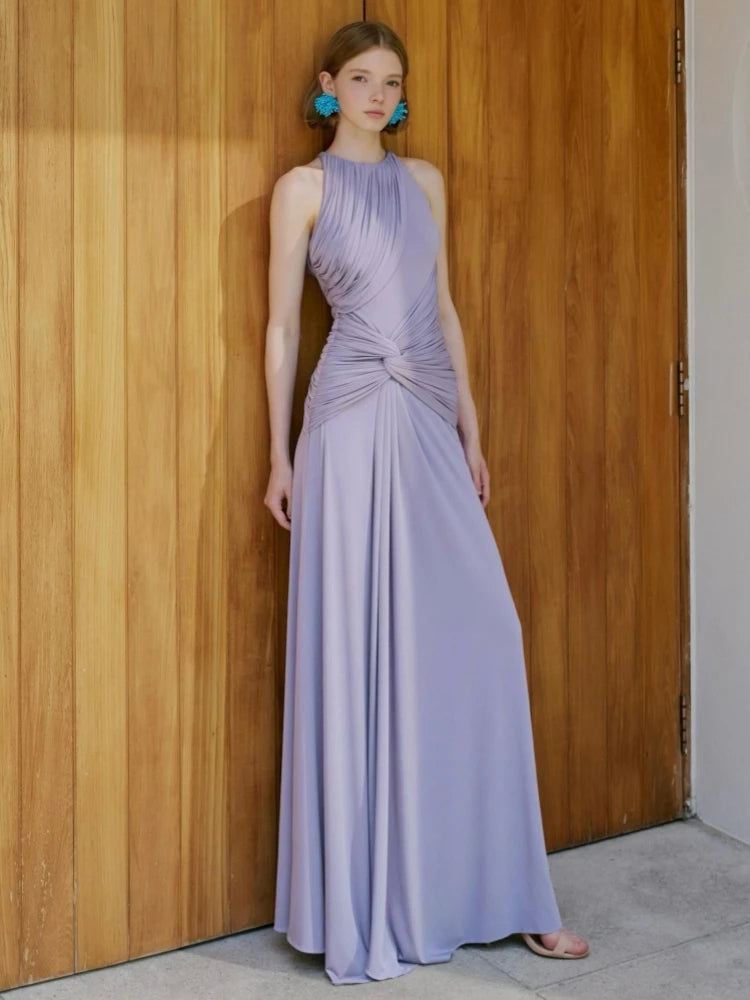 Draped Neck Maxi Dress against wooden door