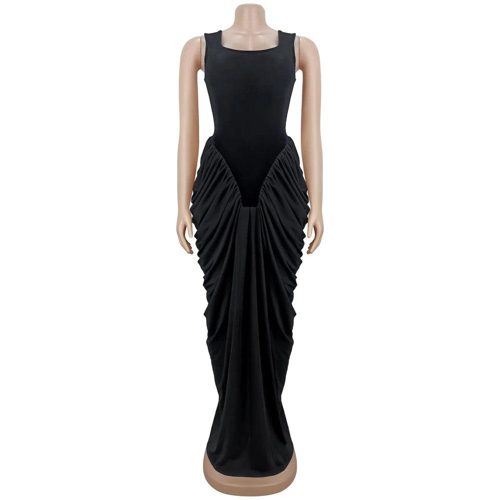 Black evening gown on a mannequin against a white background