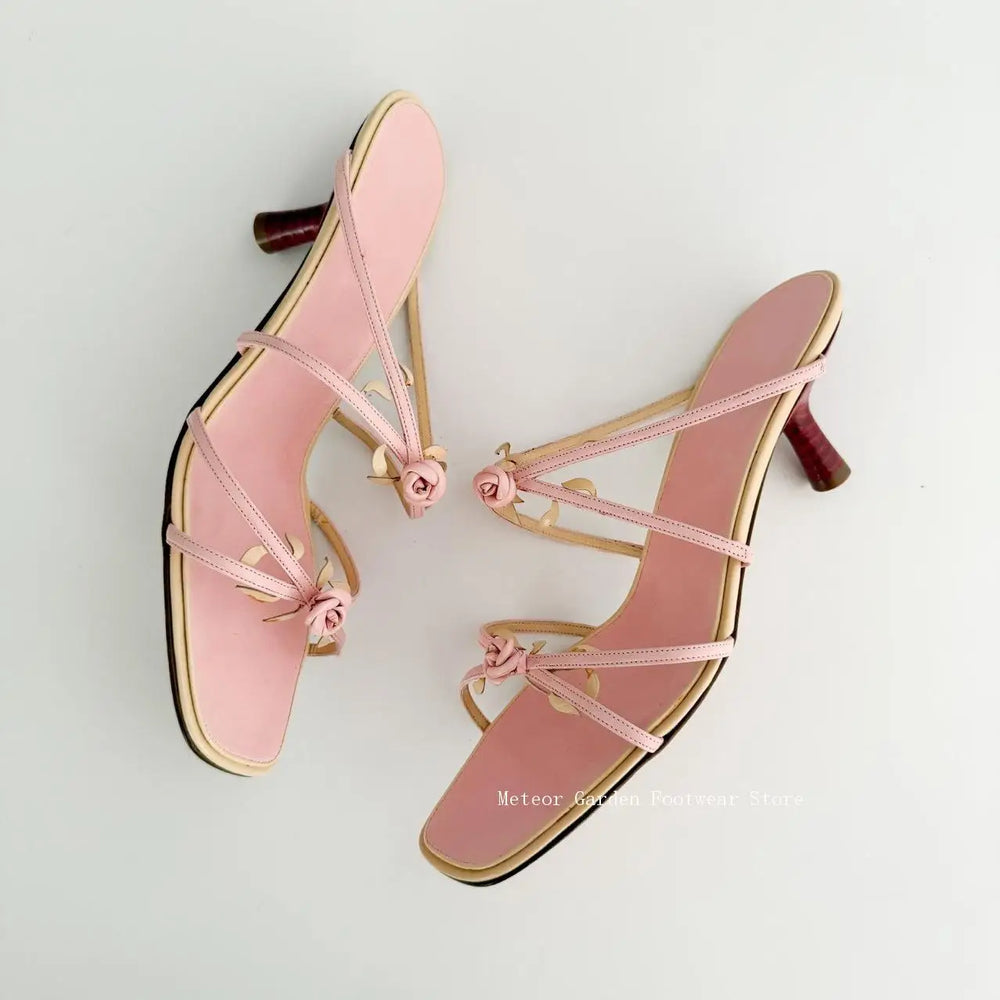 Detailed view of pink rose square toe low heel sandals heel
