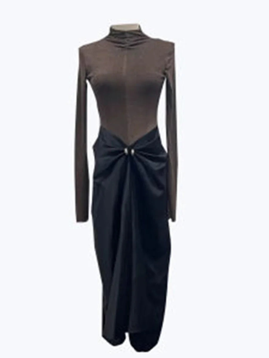 Mannequin wearing a two-tone dress with brown top and black skirt 