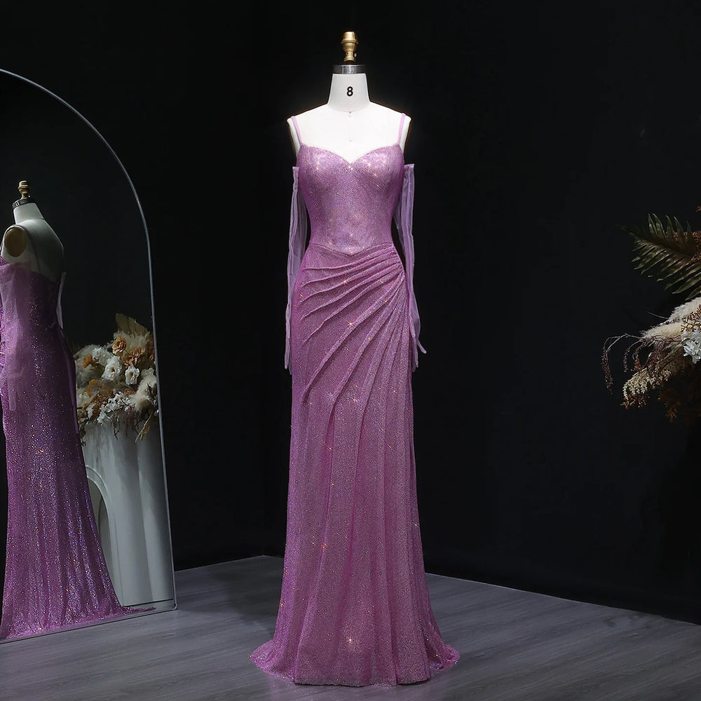 Purple evening gown on a mannequin against a dark background