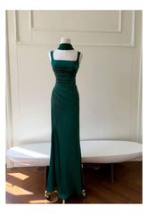 Mannequin wearing a green square neck shirred waist maxi dress