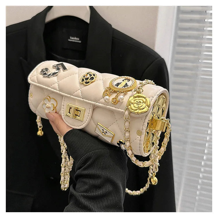 Cream quilted embellished barrel bag