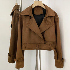 Brown faux leather cropped jacket with asymmetric lapel and belt