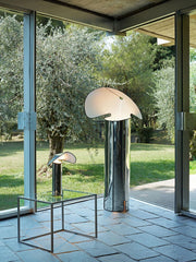 A sleek, modern LED table lamp with a minimalist design on a  desk in a Garden C