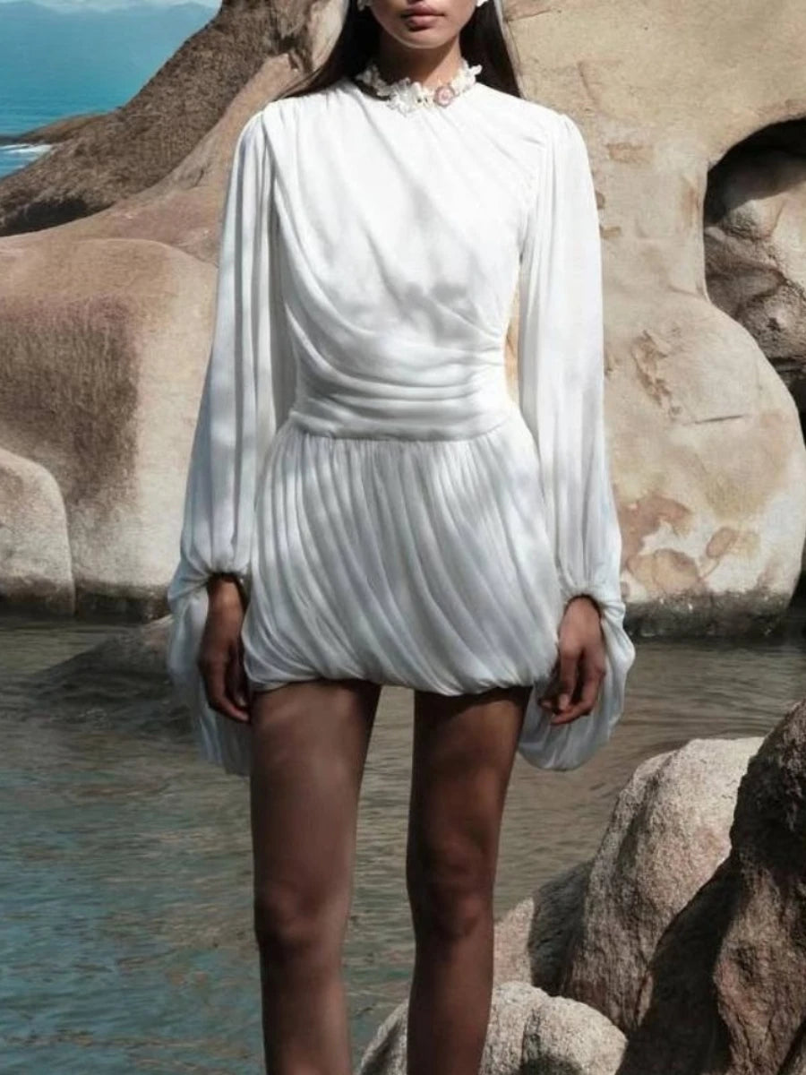 Long sleeve draped mini dress on model