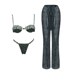 Zebra print bikini top and bikini bottoms with cover-up pants laid flat