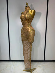Back view of chain embellished halter gown