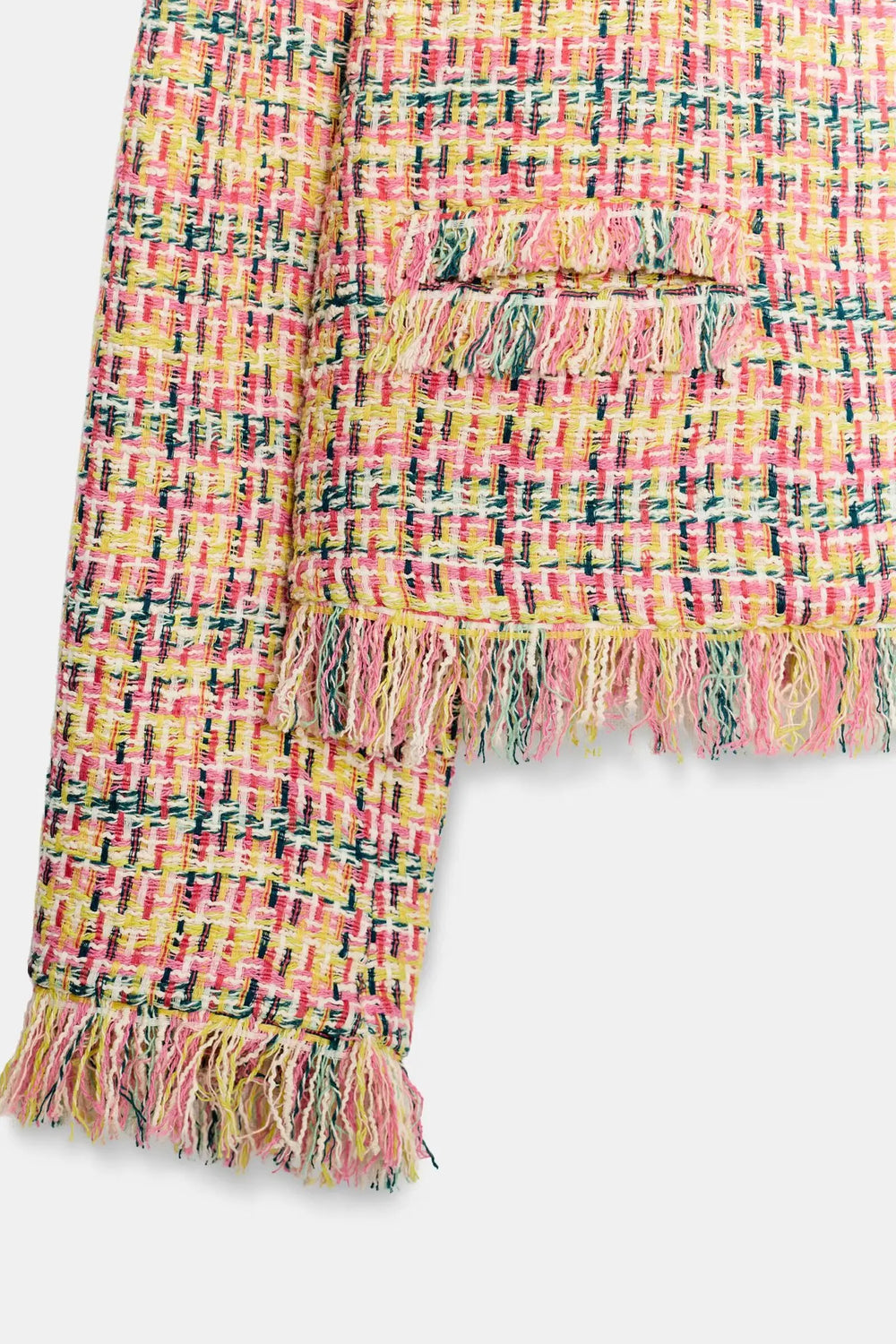 Tweed fringe cropped jacket hem and sleeve detail