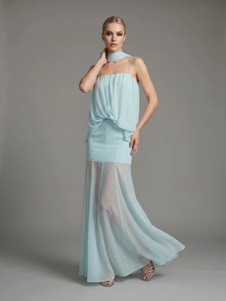 Side profile of chiffon spaghetti strap maxi dress