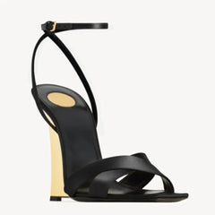 Black wedge heel ankle strap sandal with gold accent