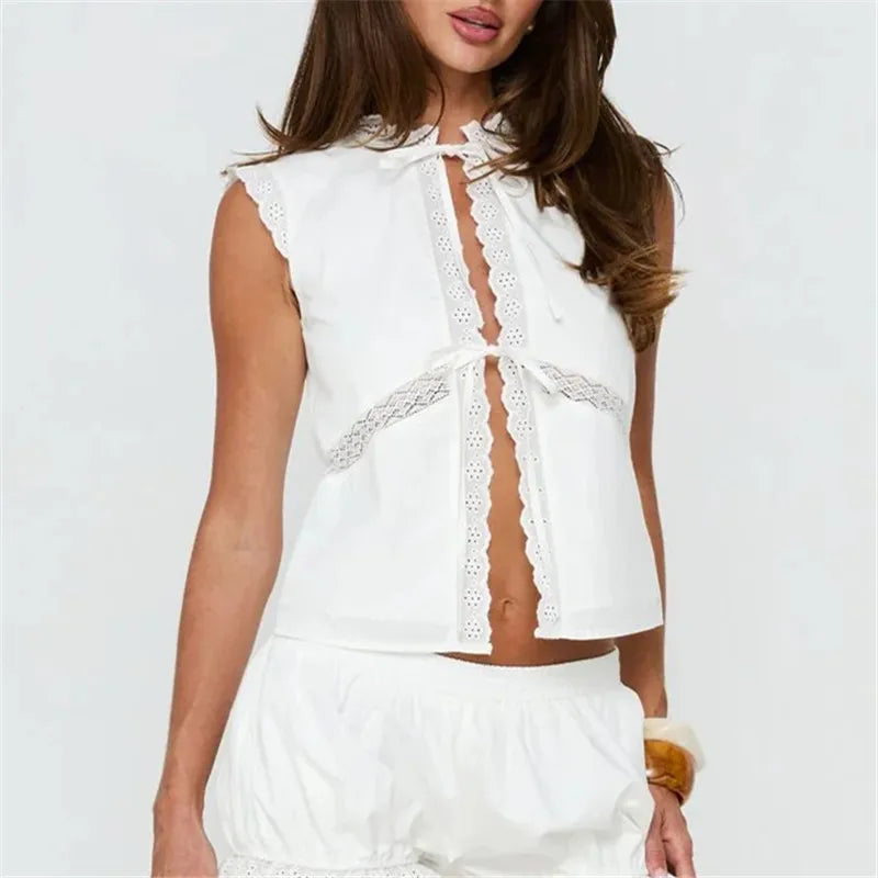 Eyelet lace tie front sleeveless top detail