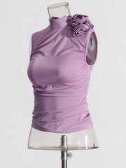 Purple sleeveless top on a mannequin against a white background