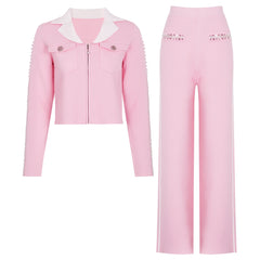 Pink knit jacket with white collar and embellished sleeves, paired with wide-leg pink trousers with white side stripes.