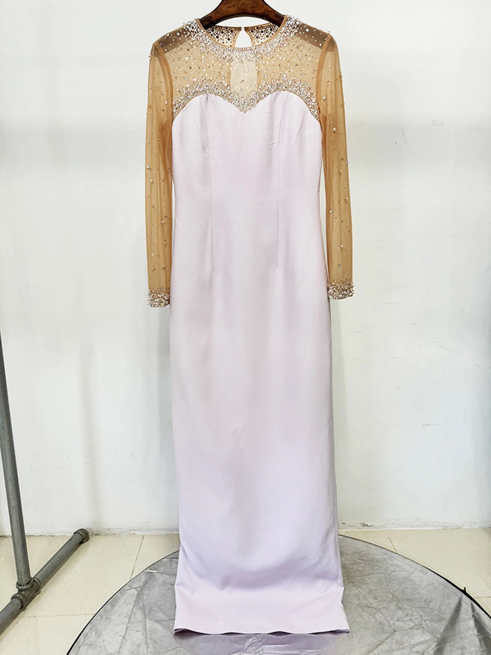 Beaded mesh illusion neckline column gown on hanger