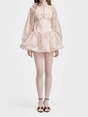 Full length view of a floral puff sleeve mini dress