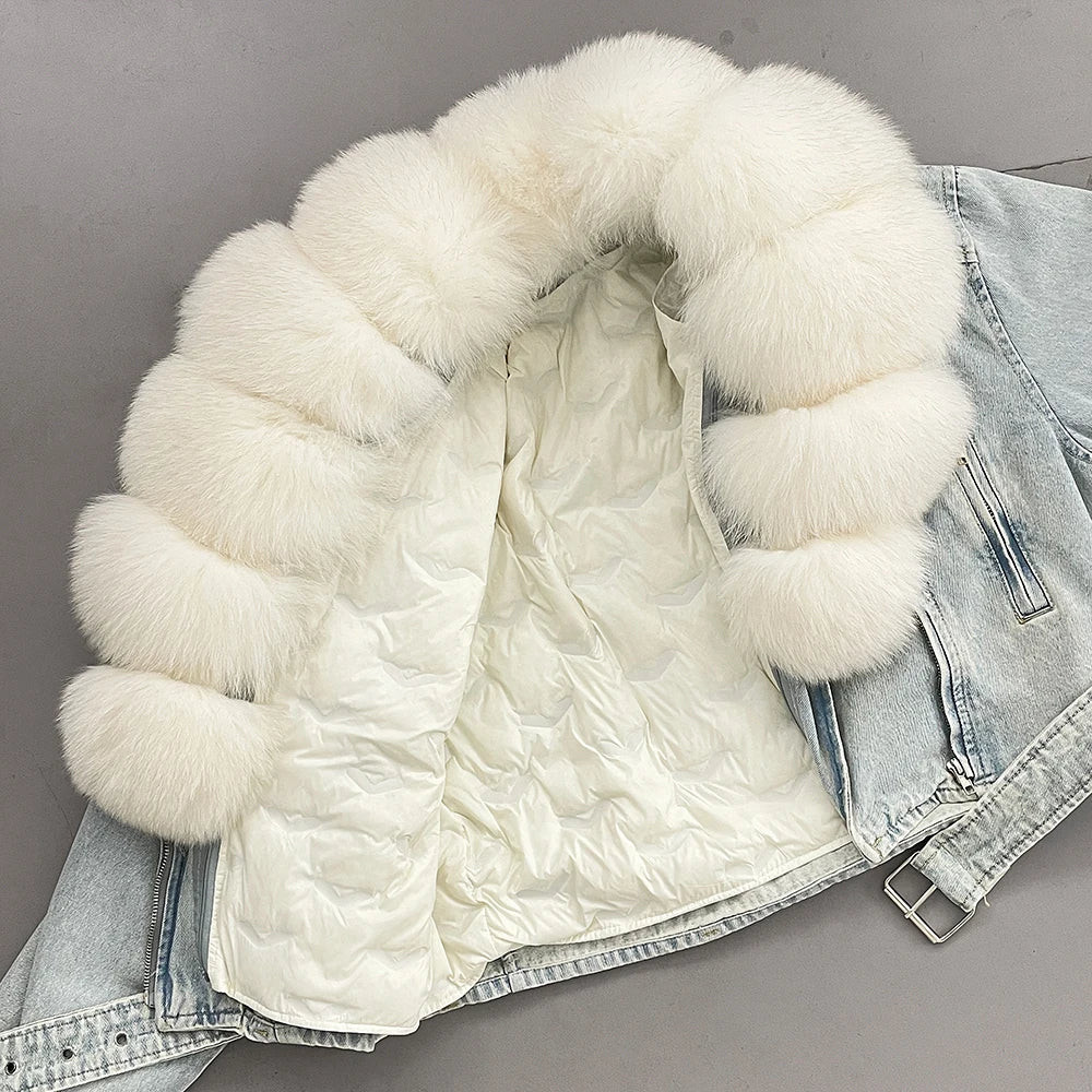 White puffer jacket with fur trim on a gray background