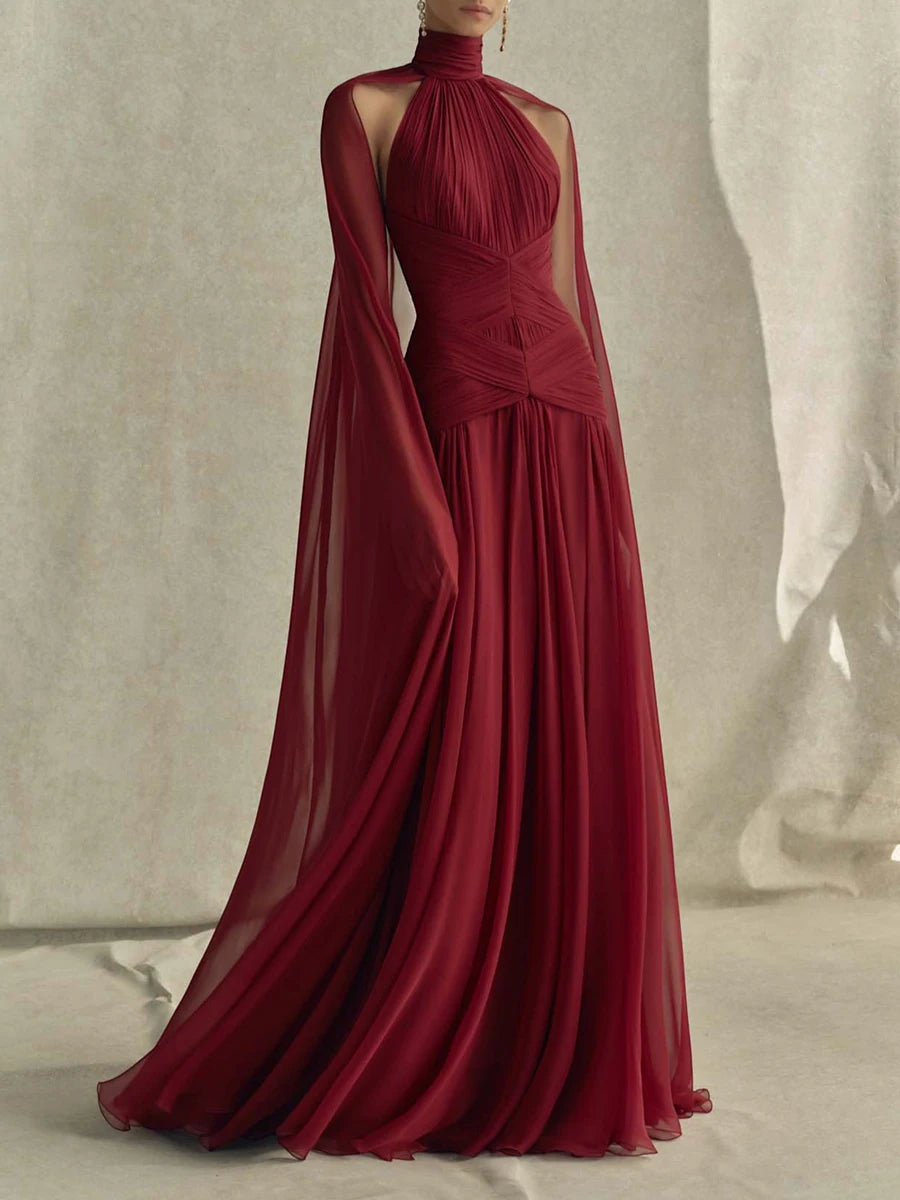 Halter neck maxi dress with flowing cape sleeves