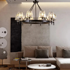 Lifestyle image showcasing the black chandelier as a bold focal point in a contemporary living room. Golden Atelier 2