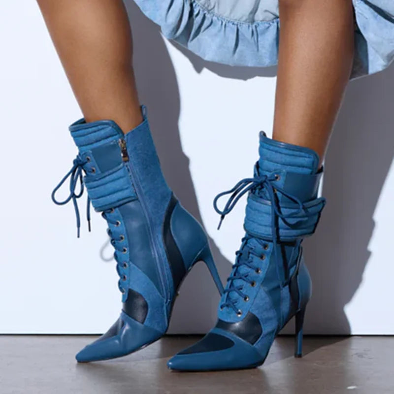 Patchwork high heel ankle boots in various shades of blue and black.