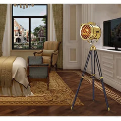 Modern Golden color steel floor lamp with a sleek design, standing in a brightly lit Bed room. Golden Atelier 3