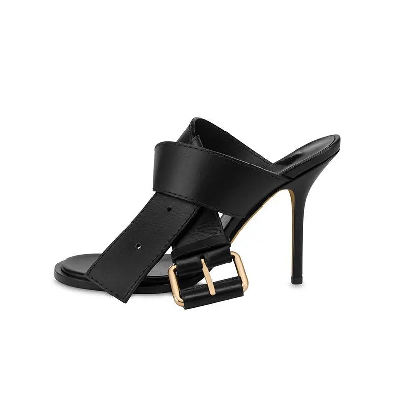 Side view of black buckle strap stiletto mule