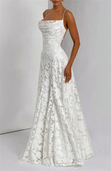 White lace dress on a plain background
