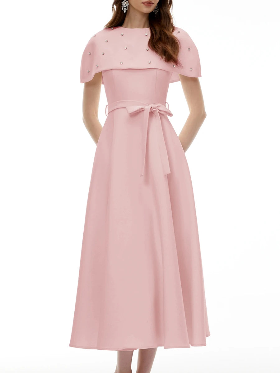 Pink midi dress with embellished cape and sash belt