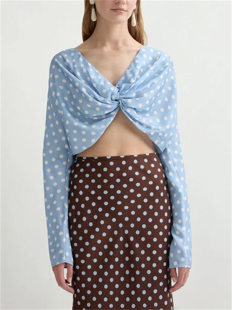 Light blue polka dot twist front crop top paired with a brown polka dot skirt